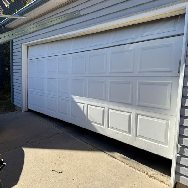 If we notice unusual noises or erratic movement when operating the garage door, it’s essential to address these signs immediately.